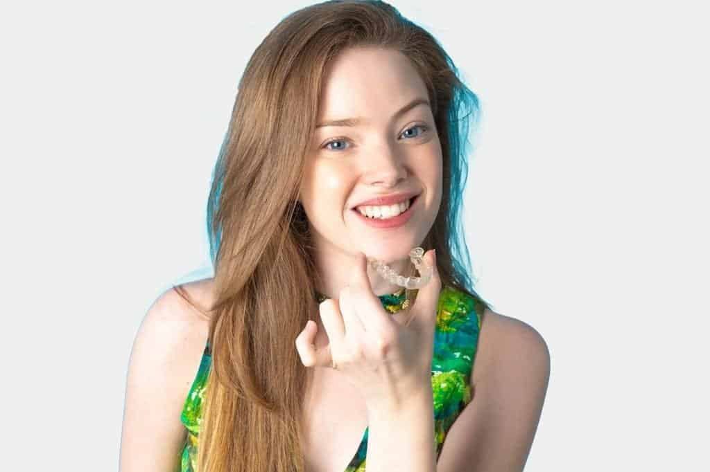 Teens using Invisalign clear aligners